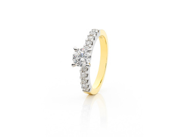 Four Claw Set side Diamond Engagement Ring